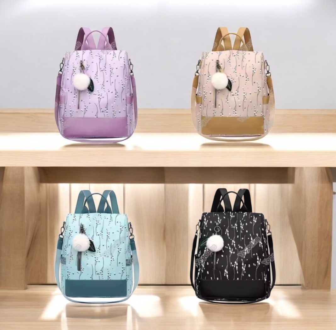 MOCHILA ANTIRROBO POMPOM